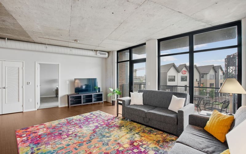 living room at The Flats at East Bank Apartments 